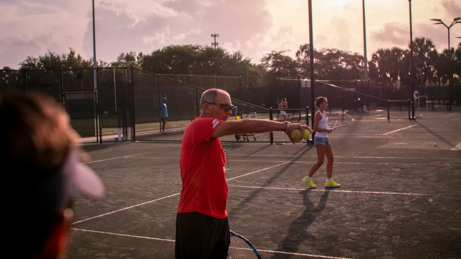 Nick Saviano coaching on court at the academy